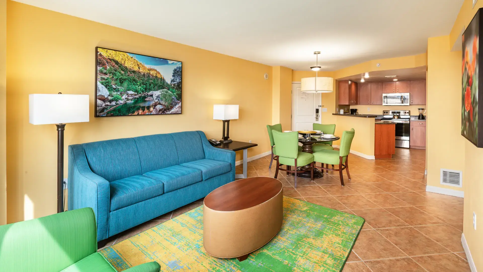 Suite interior with full kitchen, living area, and dining space at The Grandview at Las Vegas