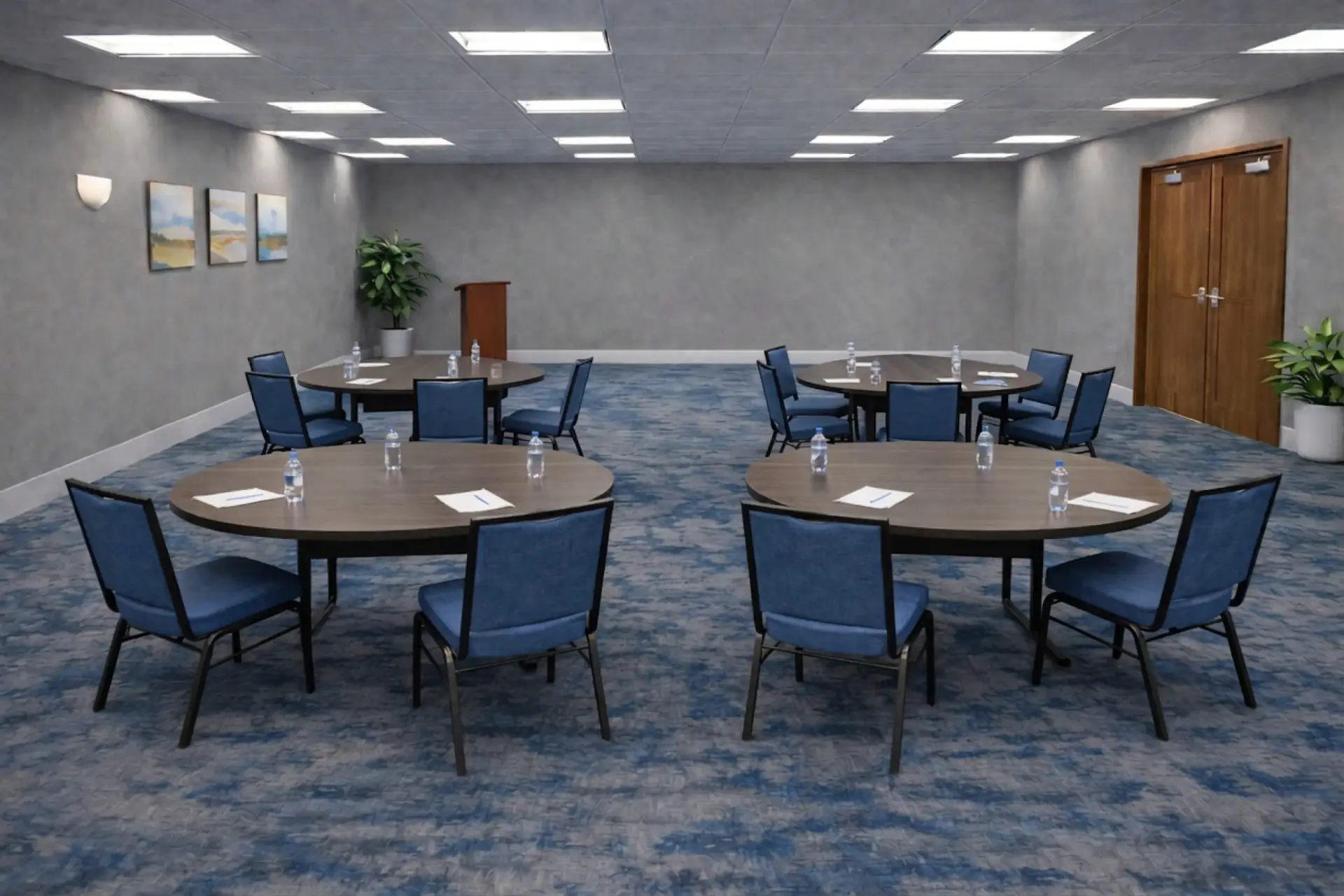Breakout meeting room arranged in pods with oval tables