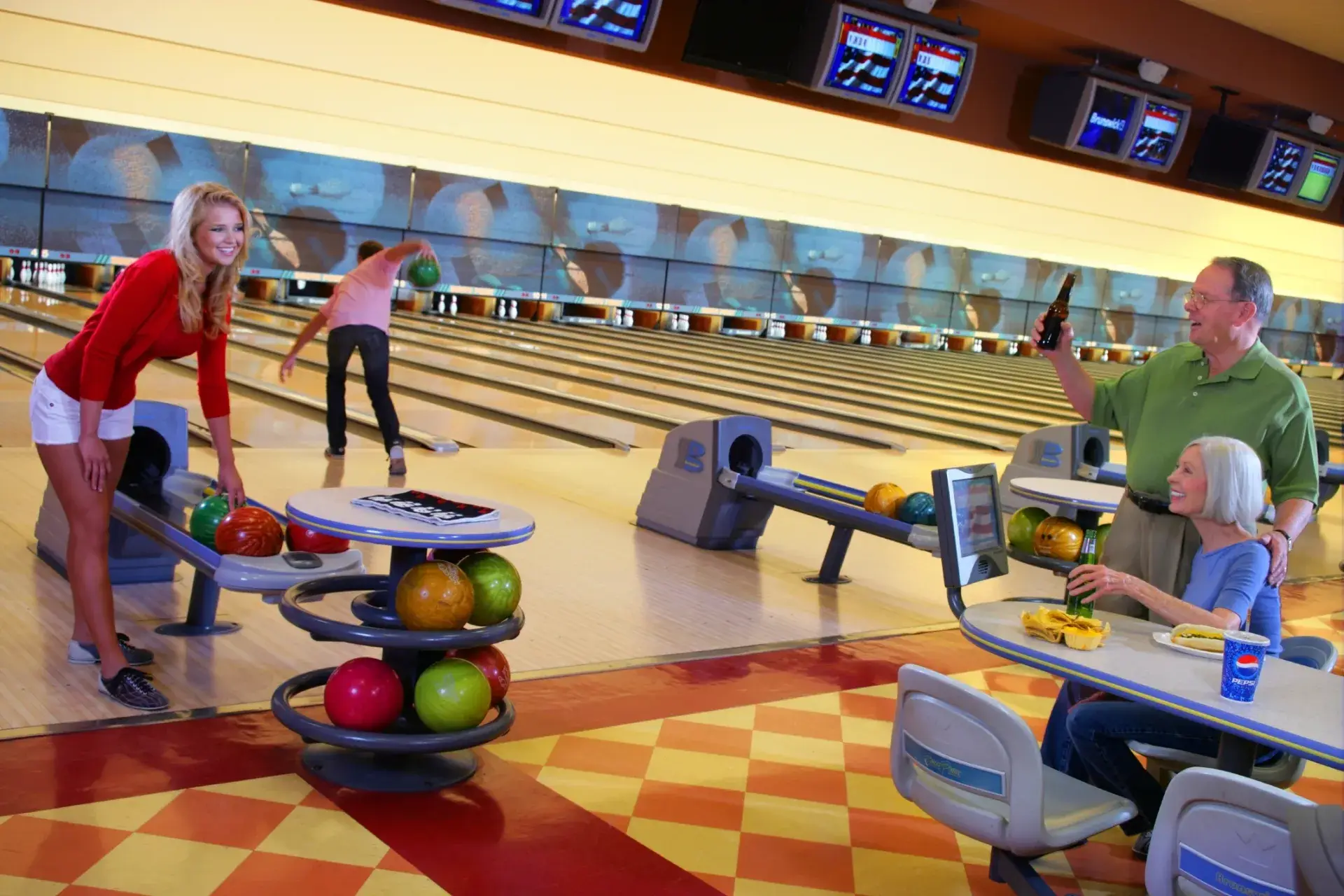 Guests bowling and dining at the South Point bowling center