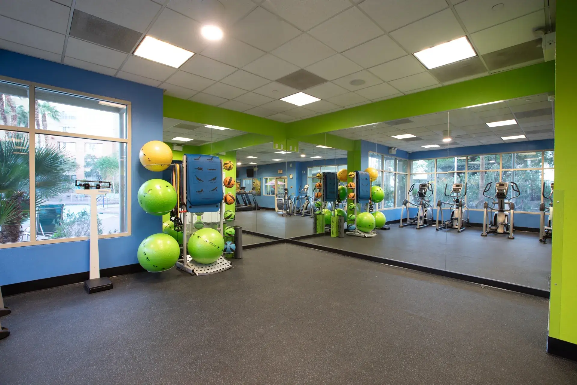 Cardio fitness center with aerobic balls and exercise foam mats