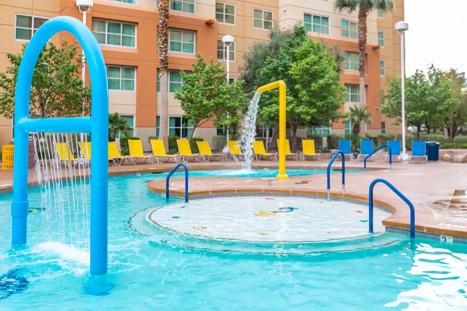 Activity pool with water features for children