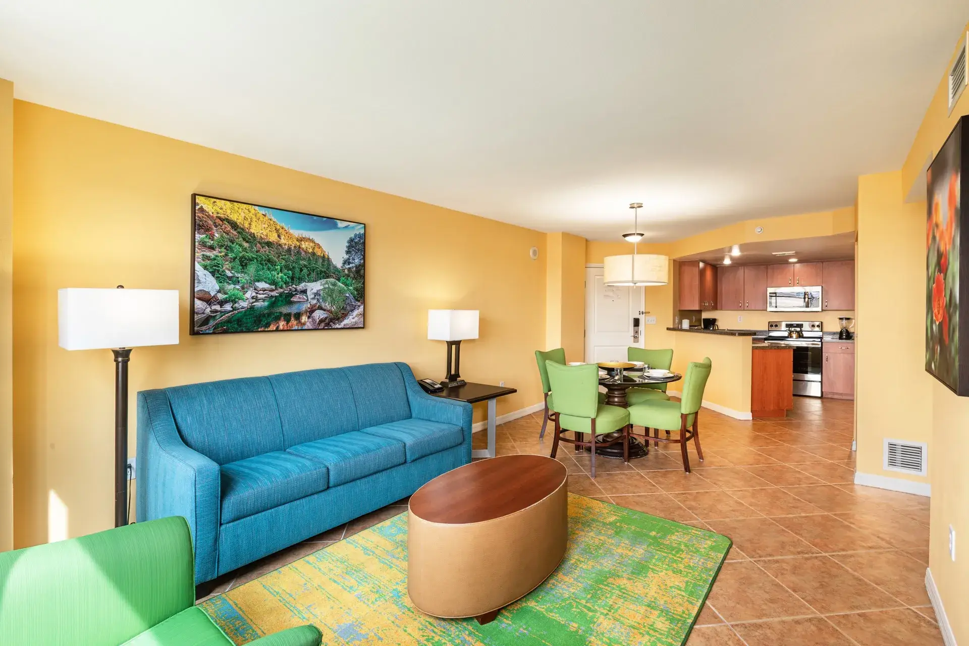 A dining room, living room, and kitchen