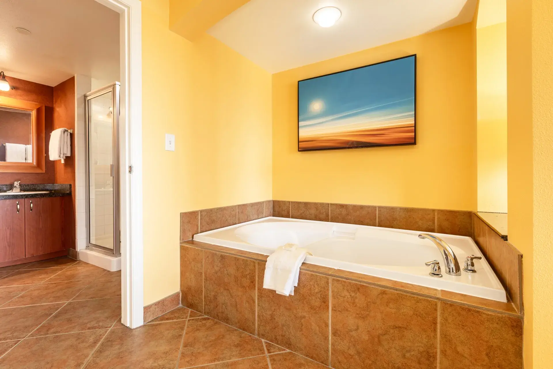 A jetted tub in primary bedroom
