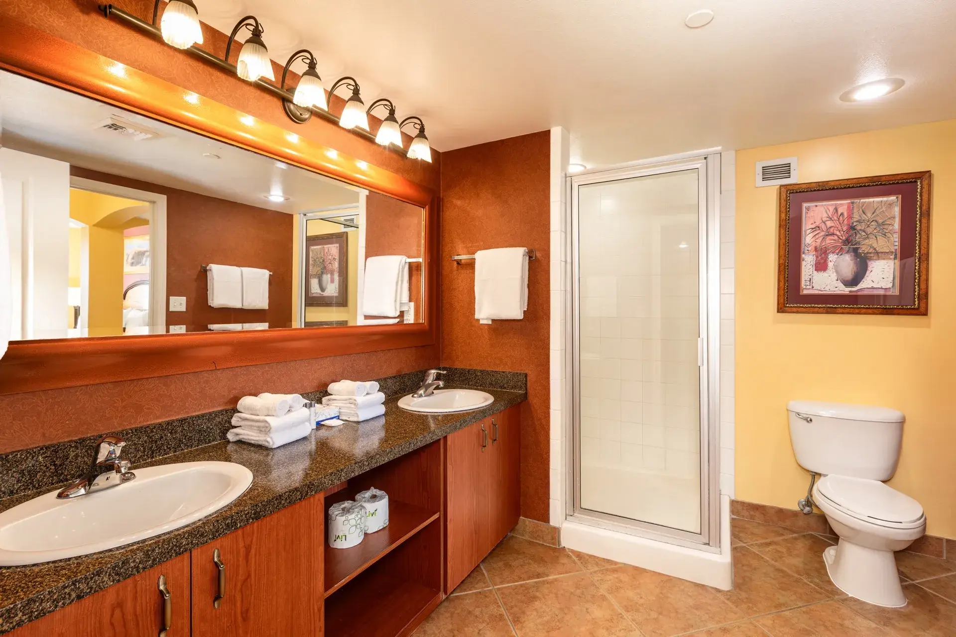 Primary bathroom with double sink vanity and walk-in shower